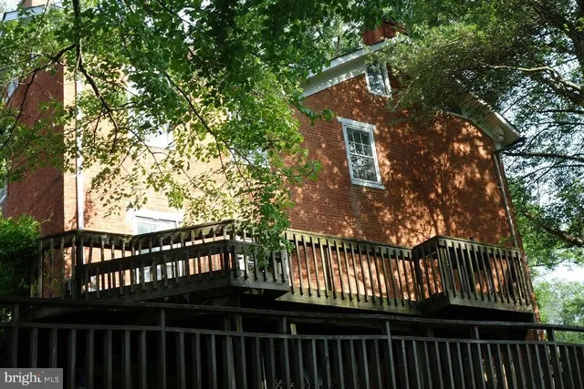 a view of a wooden fence