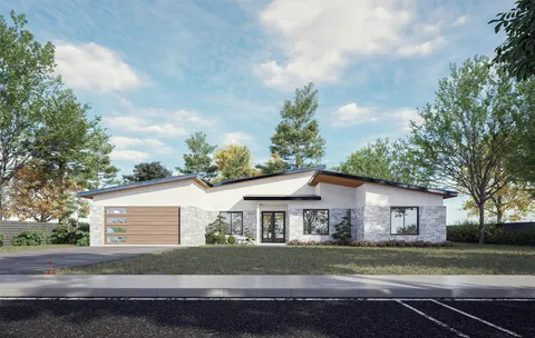 a room with cabinets and washer