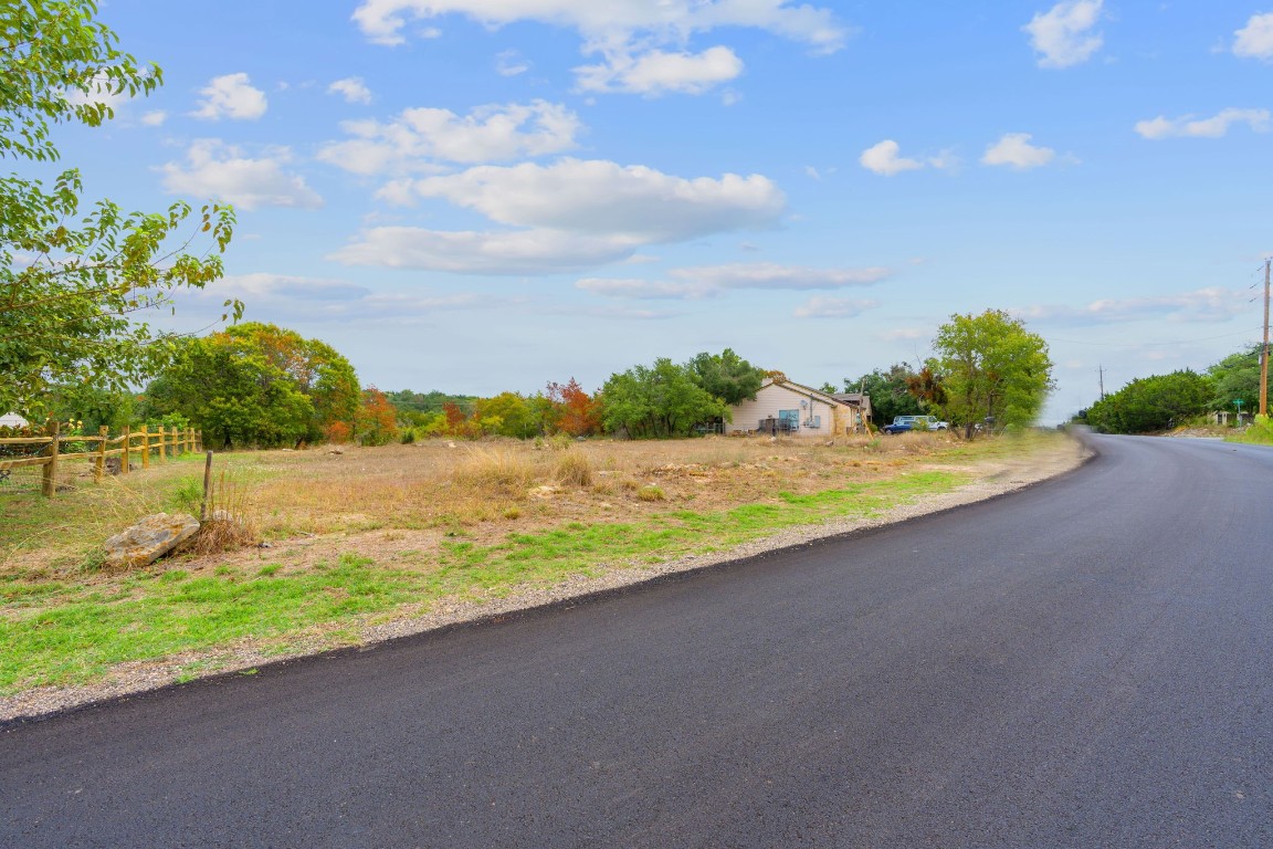 14500 Debba Drive Austin, TX 78734 - Photo 6 of 27 a view of a lake with a big yard