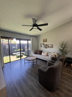 10267 Boca Bend West, Unit G4 Boca Raton, FL 33428 - Photo 1 of 21 a living room with furniture and a large window