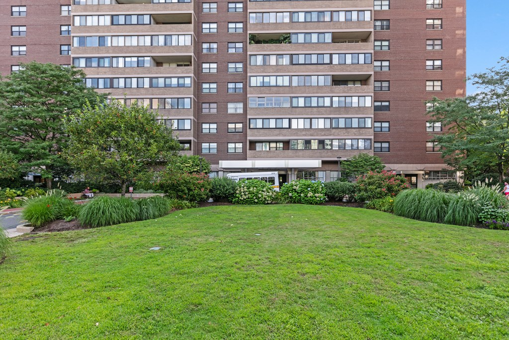9 Hawthorne Place, Unit 9K Boston, MA 02114 - Photo 21 of 22 a view of a building with garden and trees