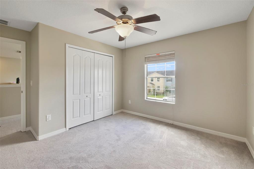 1209 Seburn Road Apopka, FL 32703 - Photo 18 of 25 a view of an empty room with a window