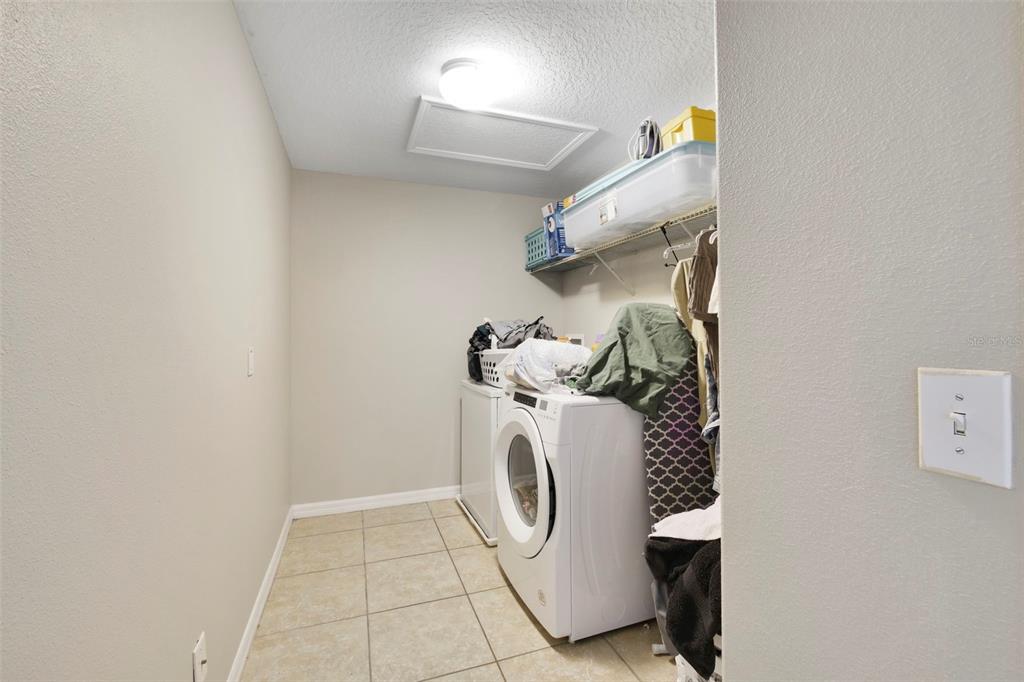 1209 Seburn Road Apopka, FL 32703 - Photo 20 of 25 a utility room with dryer and washer