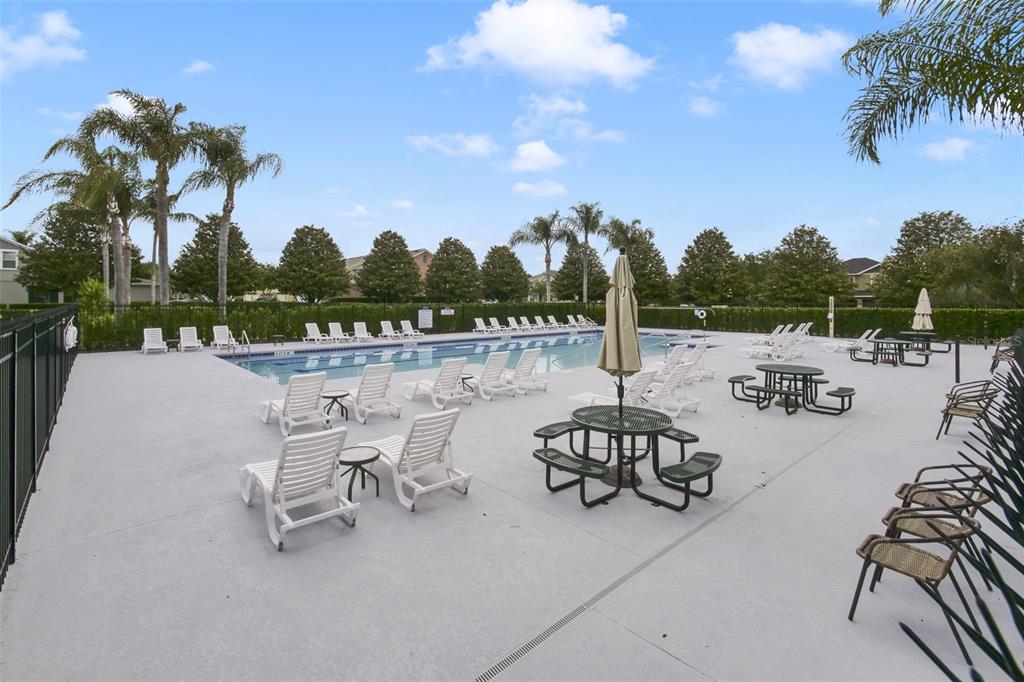1209 Seburn Road Apopka, FL 32703 - Photo 24 of 25 a view of a terrace with furniture and a garden