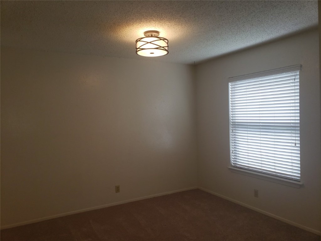 13212 Rampart Street Austin, TX 78727 - Photo 4 of 12 Formal Dining at front of home can also be extra living area.