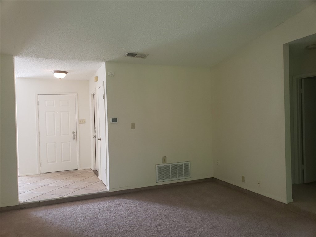 13212 Rampart Street Austin, TX 78727 - Photo 5 of 12 Entry opens to living area.