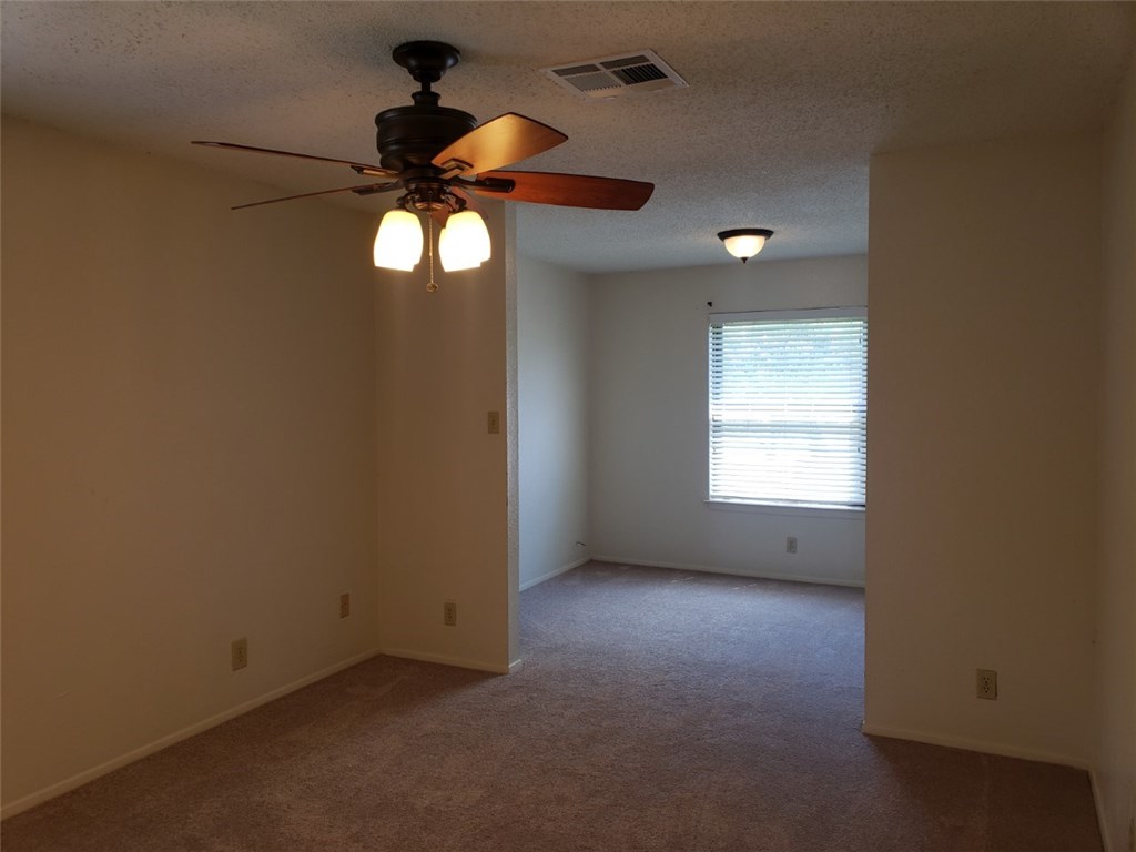 13212 Rampart Street Austin, TX 78727 - Photo 8 of 12 Master bedroom and bonus room, great for nursery, office or exercise room
