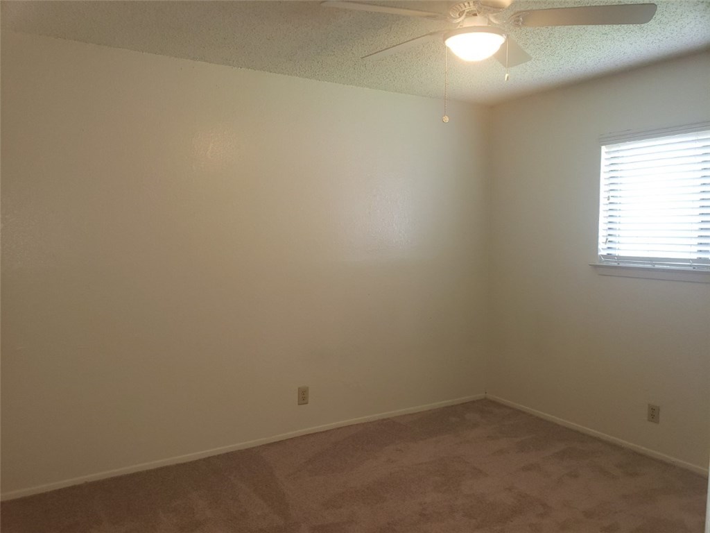 13212 Rampart Street Austin, TX 78727 - Photo 9 of 12 Bedroom 2 on opposite end of home from master bedroom.