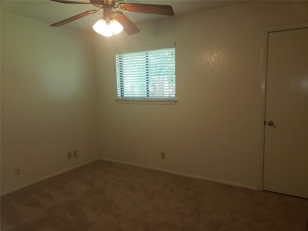 13212 Rampart Street Austin, TX 78727 - Photo 10 of 12 Bedroom 3 on opposite end of home from master bedroom.