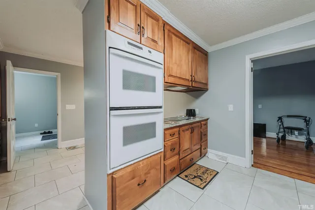 a room with a refrigerator and washer