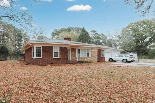 a view of a house with a patio