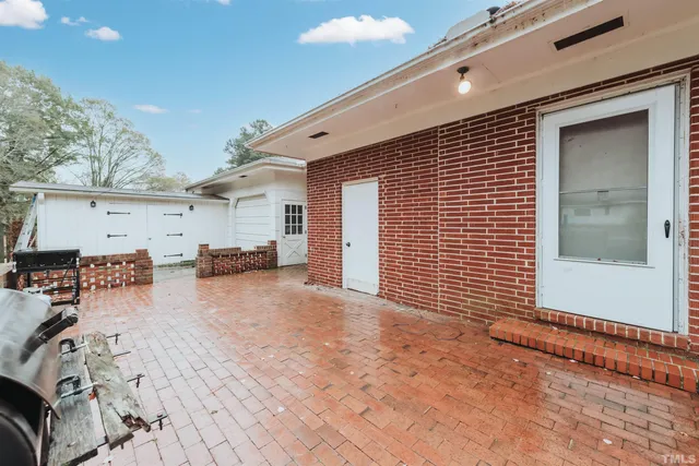 a view of a house with a patio