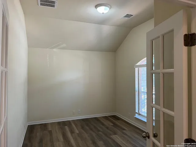 a bathroom with a sink a mirror and a bathtub