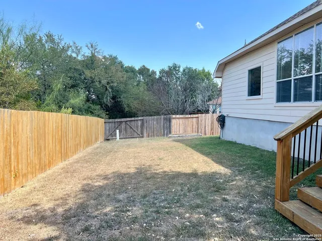 a view of a backyard with a garden