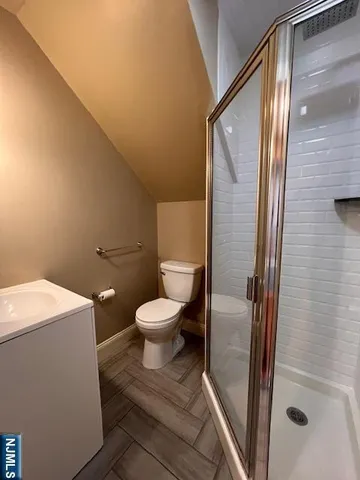 a bathroom with a toilet and a sink