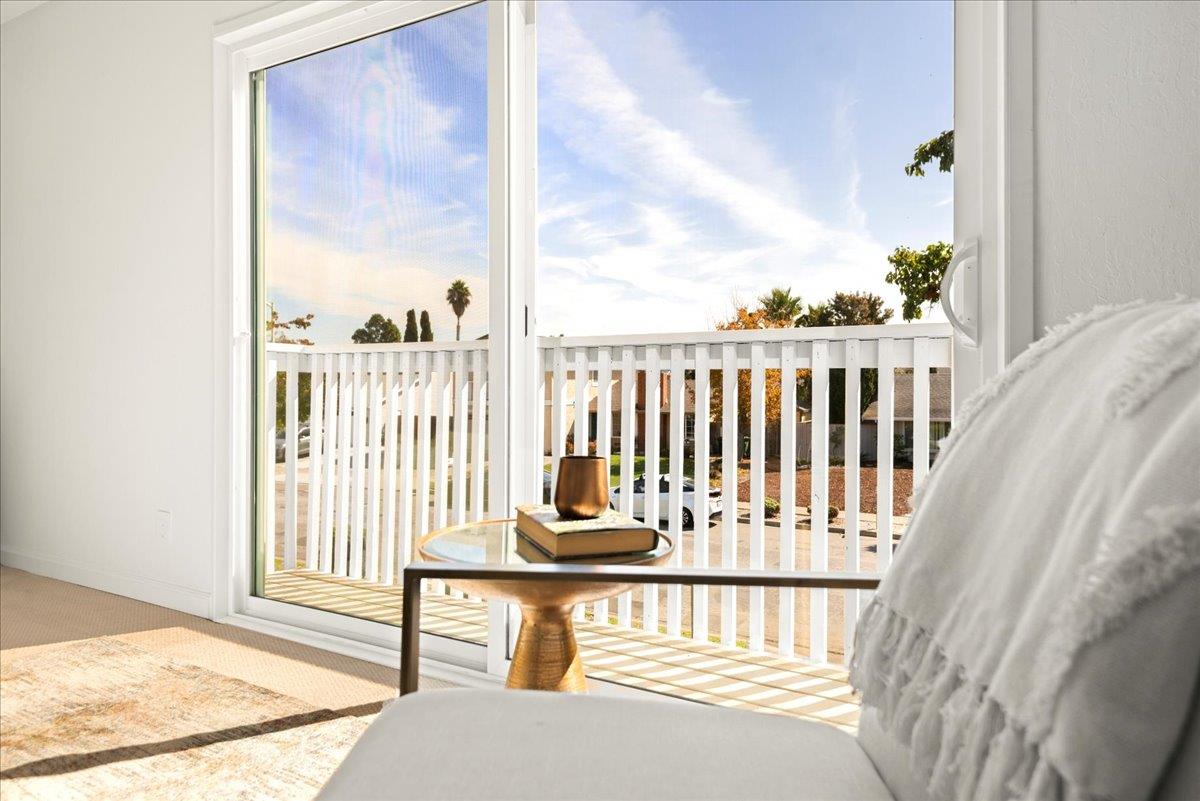 8261 Olympic Court Newark, CA 94560 - Photo 26 of 40 a view of a chair and table in the balcony