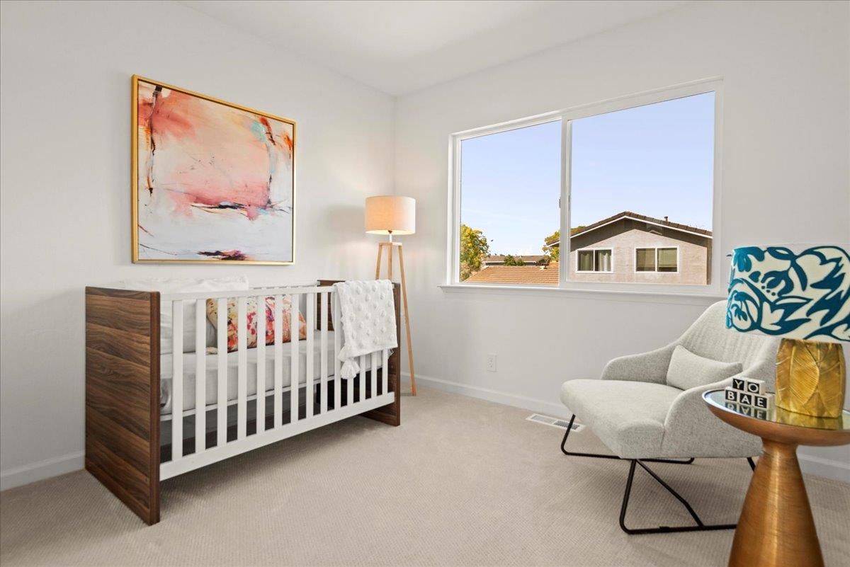 8261 Olympic Court Newark, CA 94560 - Photo 33 of 40 a bedroom with furniture and a window