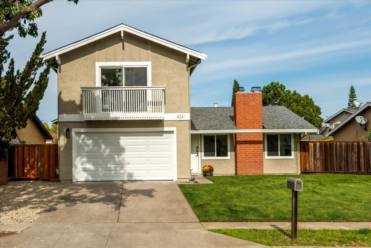 8261 Olympic Court Newark, CA 94560 - Photo 10 of 40 a front view of a house with a yard