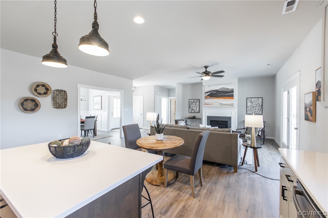 13140 Beach Road Chesterfield, VA 23832 - Photo 12 of 34 a view of a dining room with furniture and wooden floor