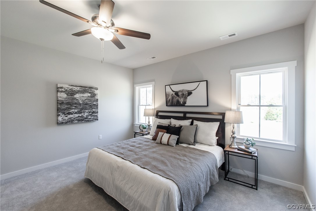 13140 Beach Road Chesterfield, VA 23832 - Photo 16 of 34 a bedroom with a bed and a window