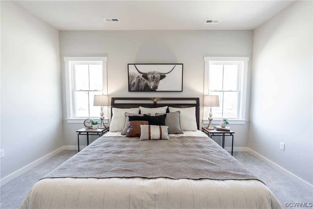 13140 Beach Road Chesterfield, VA 23832 - Photo 17 of 34 a bedroom with a bed and a window