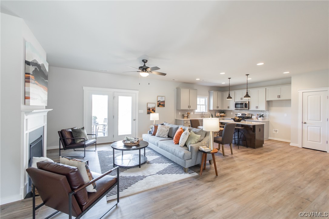 13140 Beach Road Chesterfield, VA 23832 - Photo 2 of 34 a living room with furniture and kitchen view