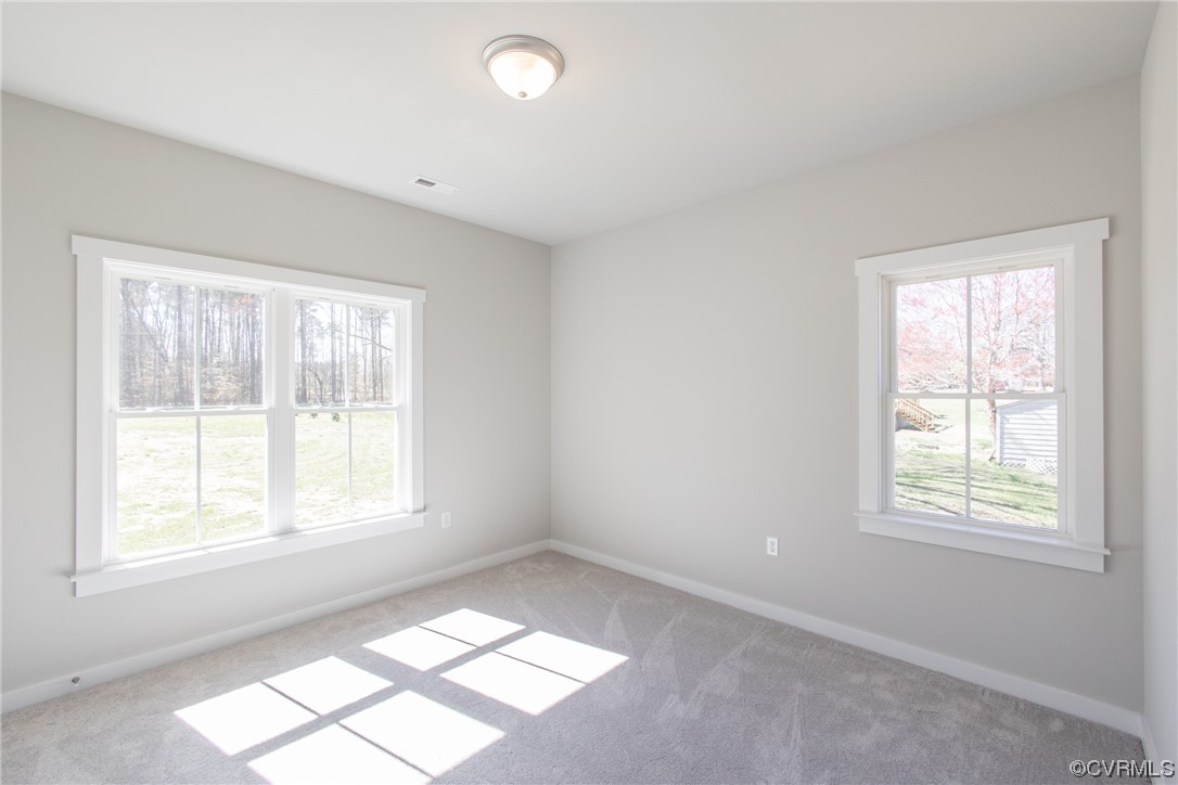 13140 Beach Road Chesterfield, VA 23832 - Photo 23 of 34 an empty room with windows