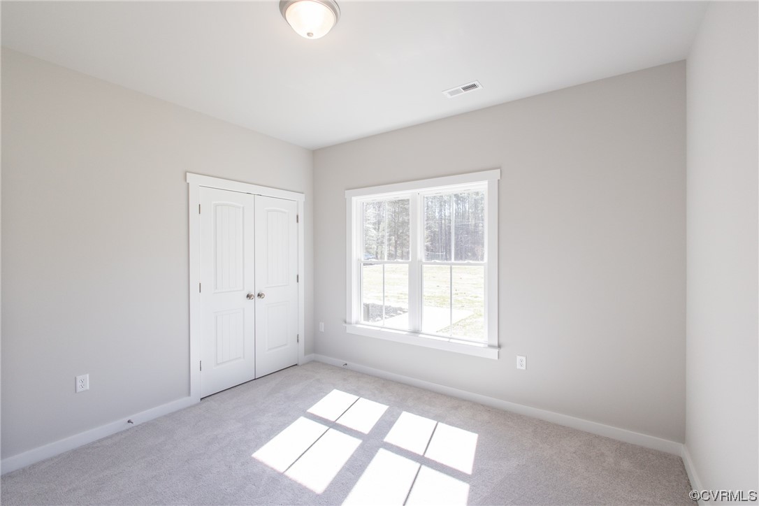 13140 Beach Road Chesterfield, VA 23832 - Photo 24 of 34 a view of an empty room with a window