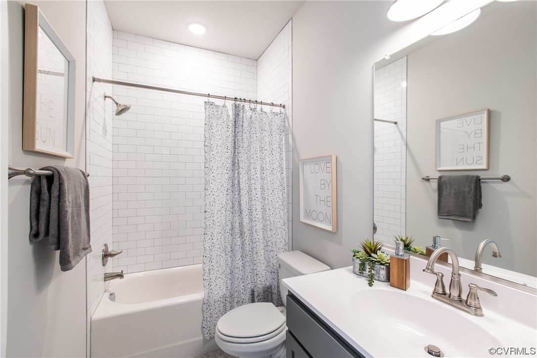 13140 Beach Road Chesterfield, VA 23832 - Photo 27 of 34 a bathroom with a sink toilet and shower