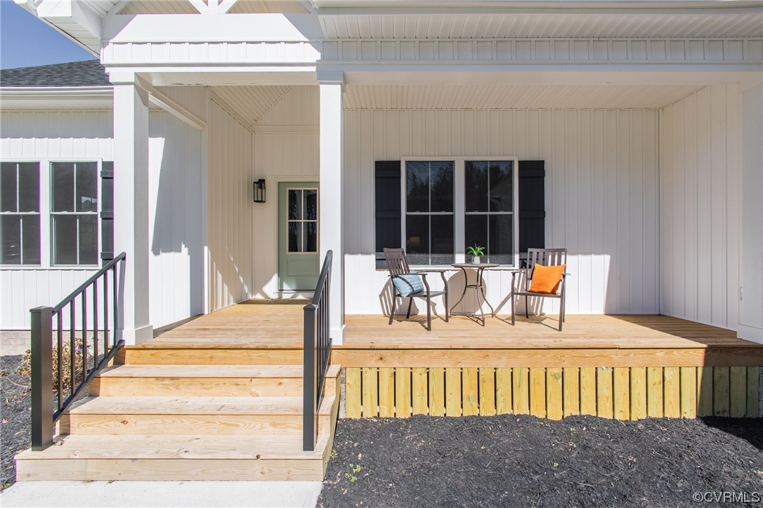 13140 Beach Road Chesterfield, VA 23832 - Photo 33 of 34 a view of a house with wooden deck and furniture