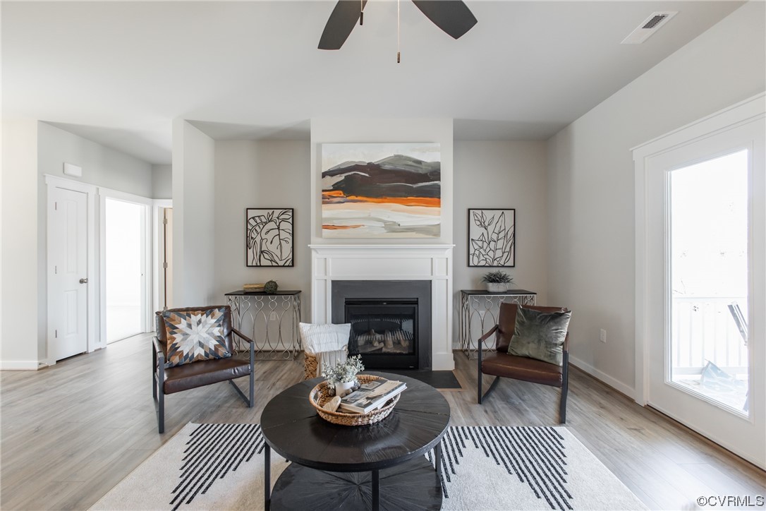 13140 Beach Road Chesterfield, VA 23832 - Photo 6 of 34 a living room with furniture and a fireplace