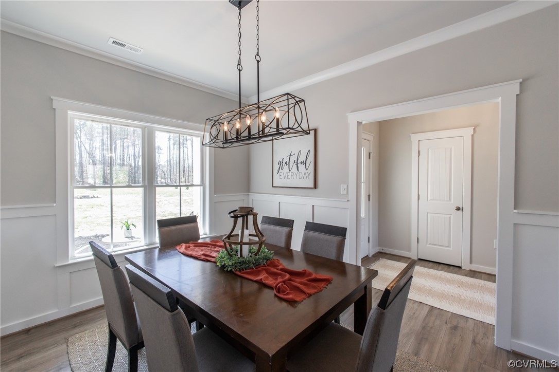13140 Beach Road Chesterfield, VA 23832 - Photo 9 of 34 a view of a dining room with furniture window and wooden floor