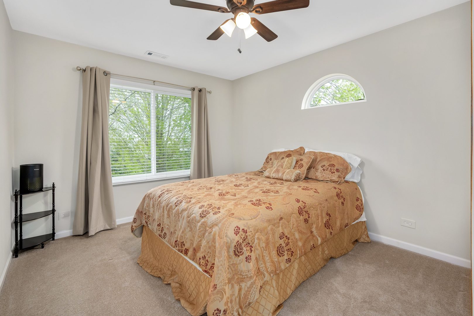 772 Rebecca Lane Bolingbrook, IL 60440 - Photo 20 of 27 a bed sitting in a spacious bedroom next to a window