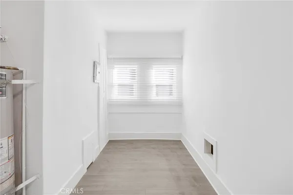 a view of a room that has a window in it