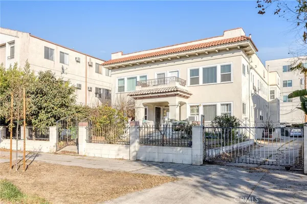 a front view of a building with street view