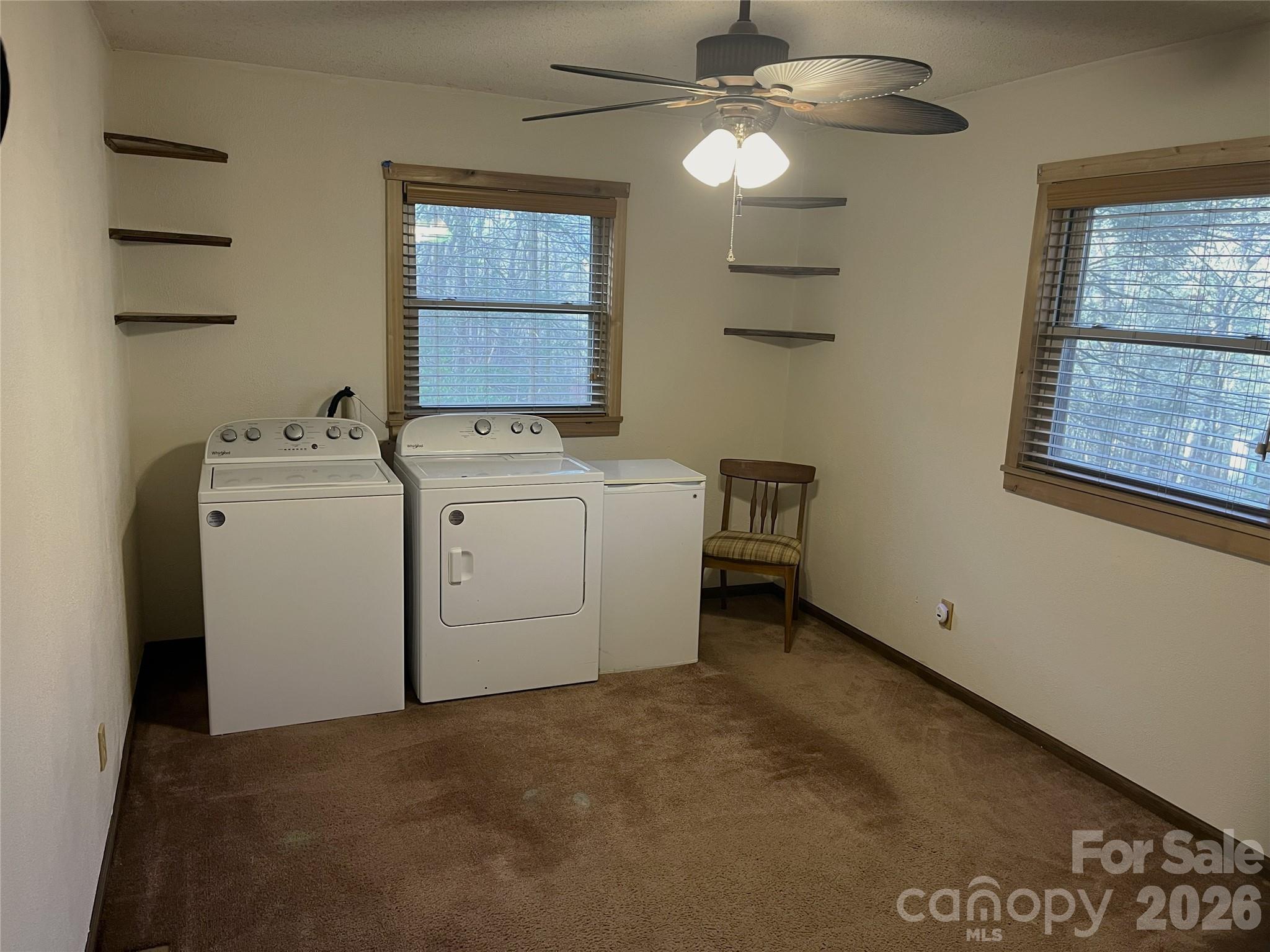 111 Buckeye Road Lake Lure, NC 28746 - Photo 15 of 48 a utility room with dryer and washer