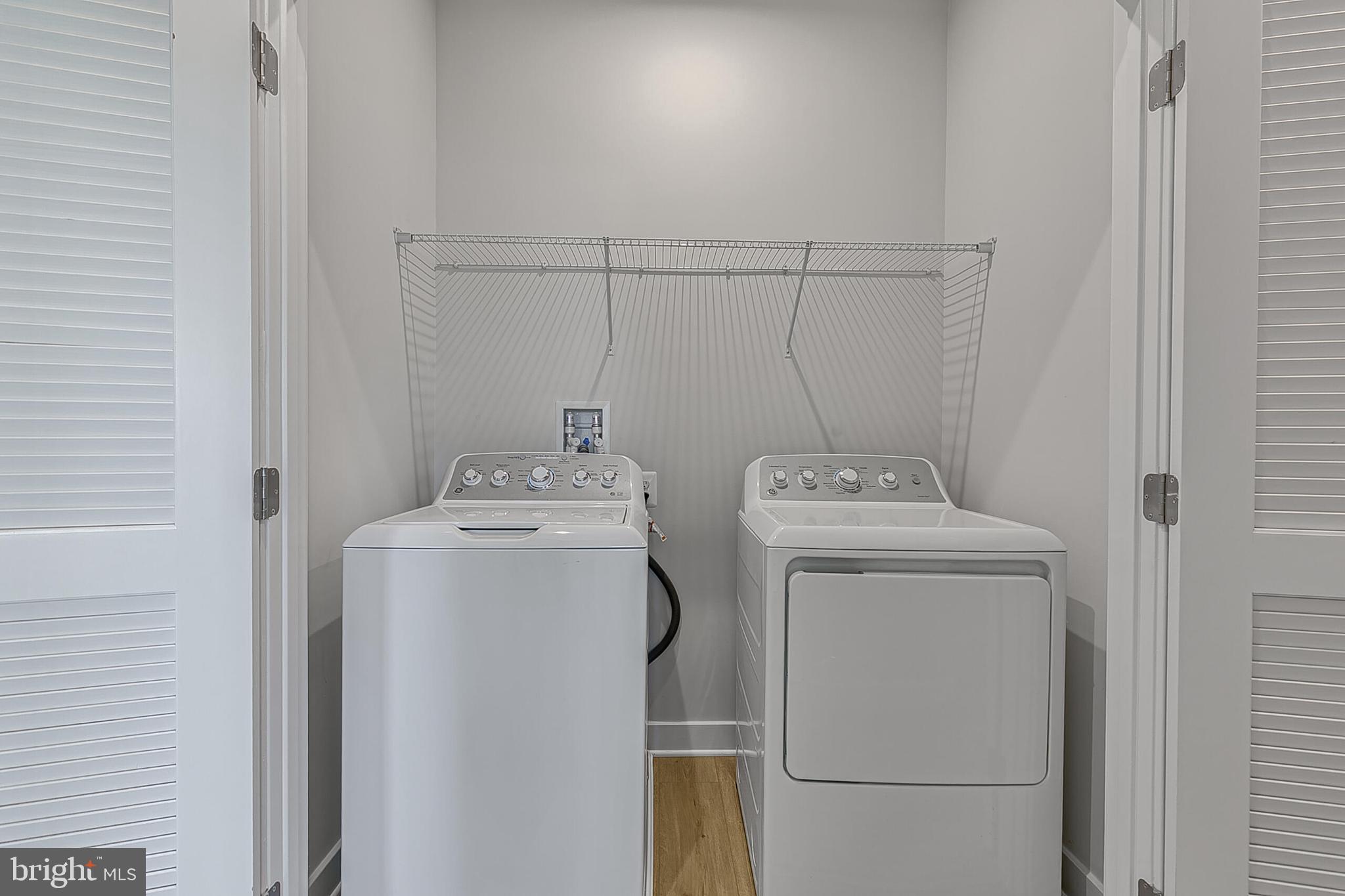 64 F Oasis Avenue Ranson, WV 25438 - Photo 32 of 39 a utility room with dryer and washer