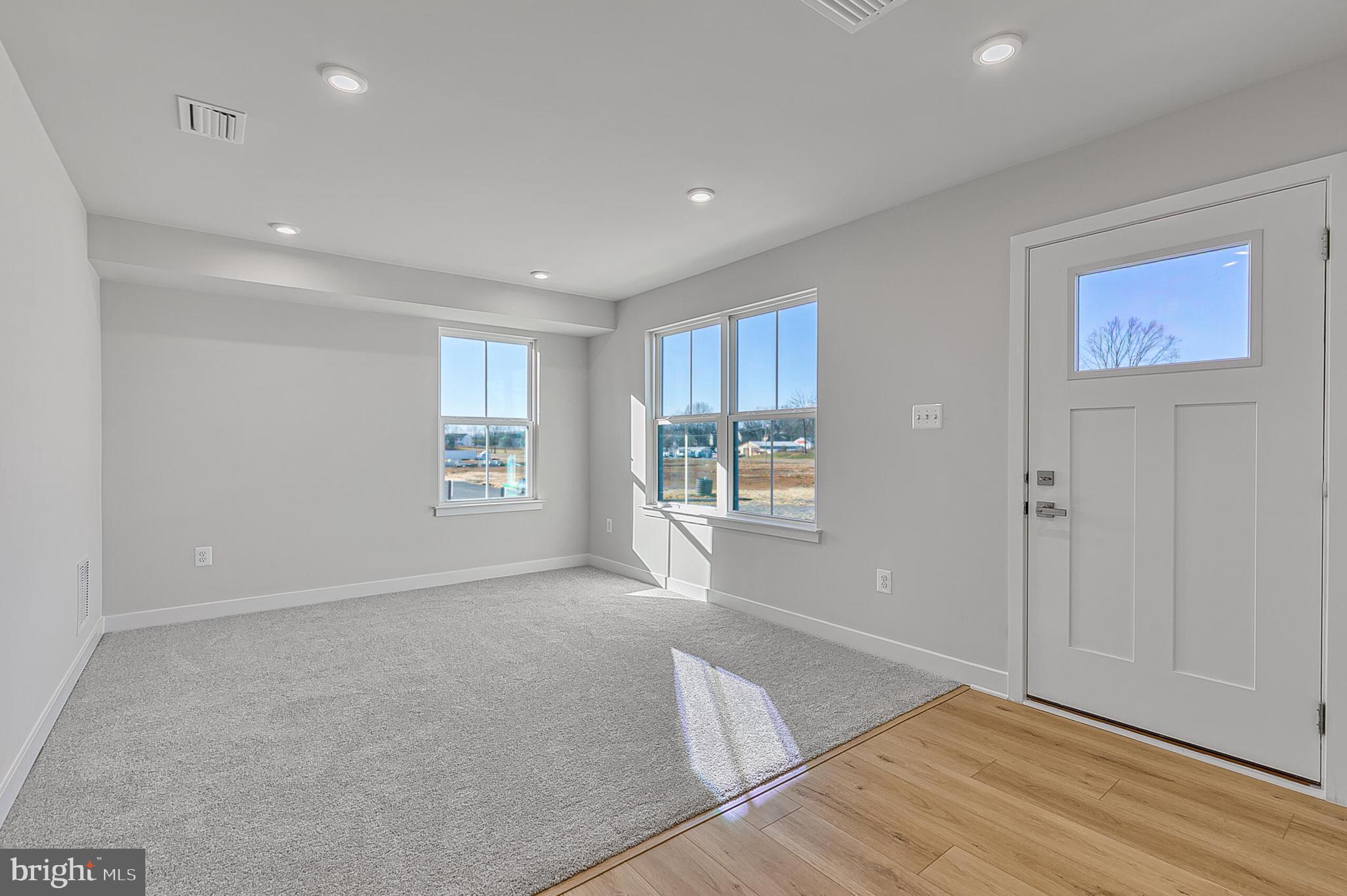 64 F Oasis Avenue Ranson, WV 25438 - Photo 5 of 39 a view of an empty room with a window