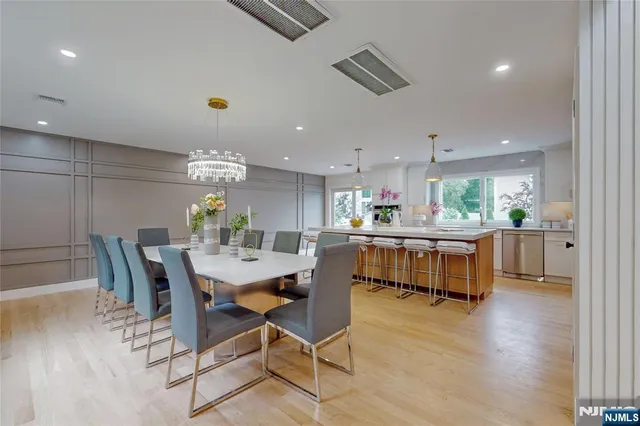 a bathroom with a toilet sink shower and mirror