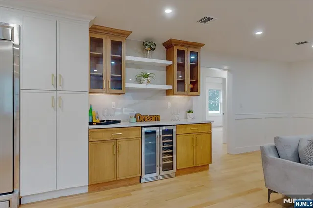 a view of a big room with wooden floor and closet