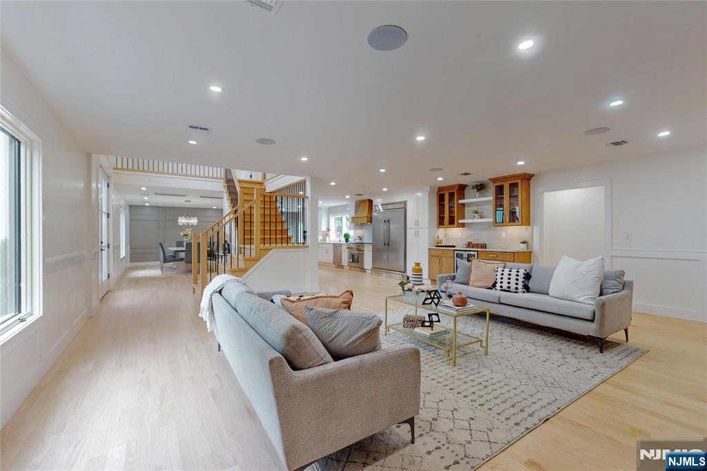415 Bailey Road Paramus, NJ 07652 - Photo 6 of 44 a living room with furniture and a wooden floor