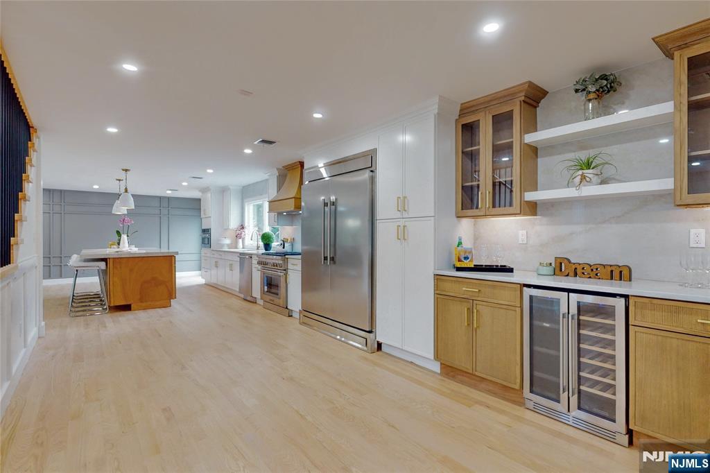415 Bailey Road Paramus, NJ 07652 - Photo 9 of 44 a kitchen with stainless steel appliances a refrigerator and a sink