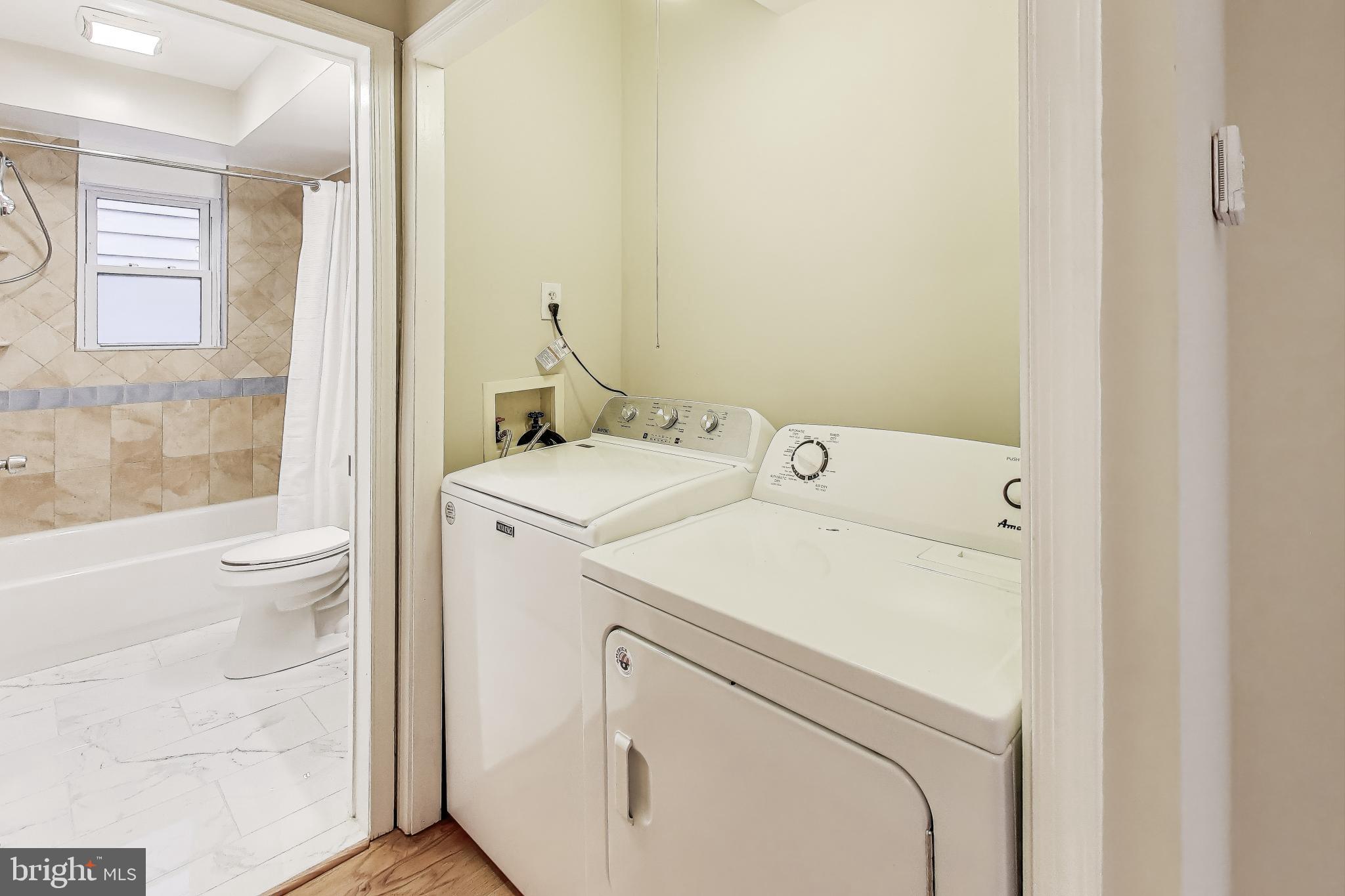 212 Elm Street Northwest Washington, DC 20001 - Photo 19 of 50 a utility room with dryer and washer