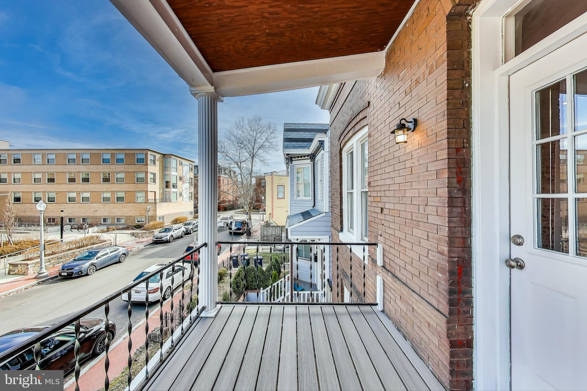 212 Elm Street Northwest Washington, DC 20001 - Photo 27 of 50 a view of a balcony with wooden floor