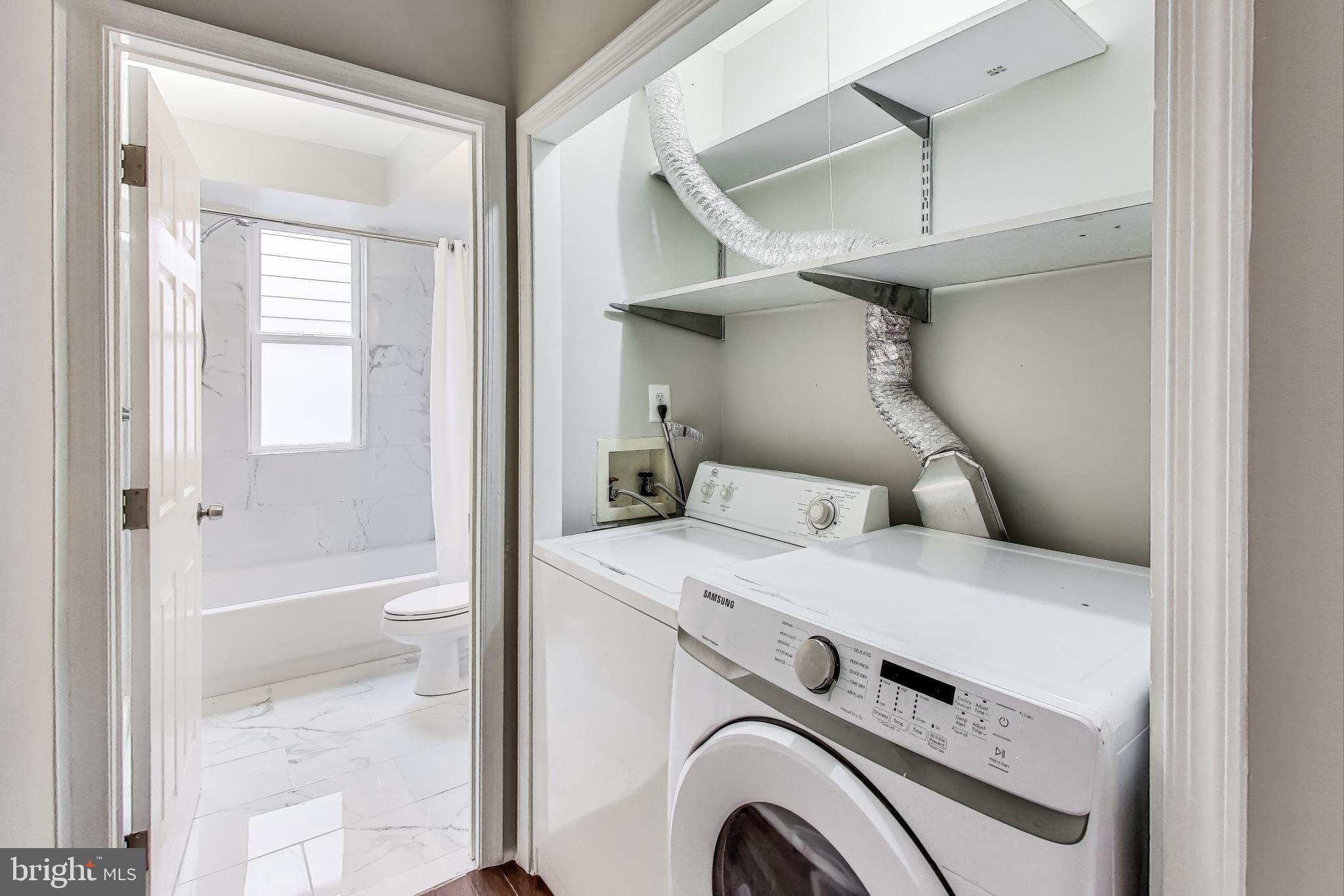 212 Elm Street Northwest Washington, DC 20001 - Photo 39 of 50 a utility room with dryer and washer