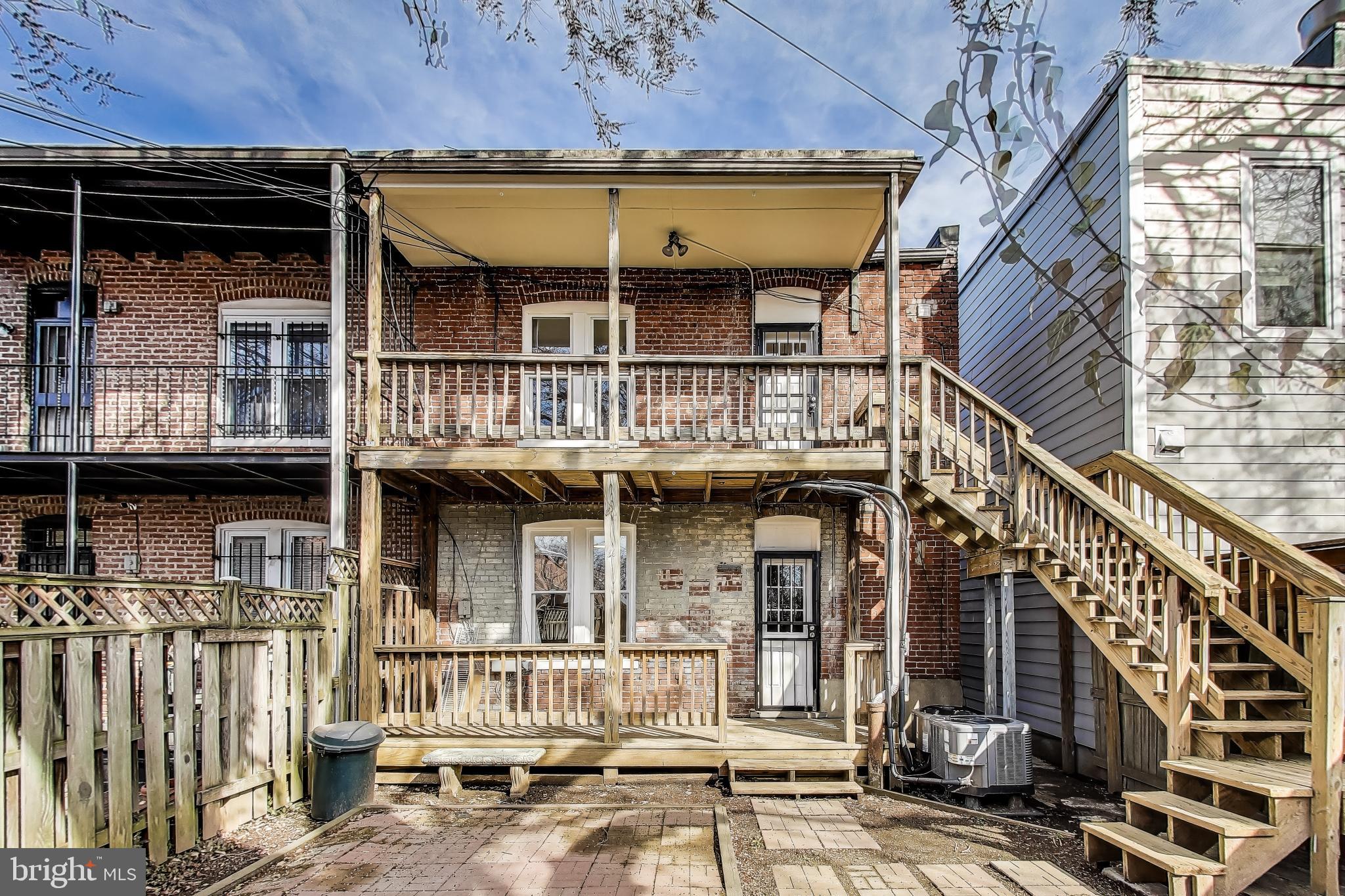 212 Elm Street Northwest Washington, DC 20001 - Photo 42 of 50 a front view of a house with a balcony