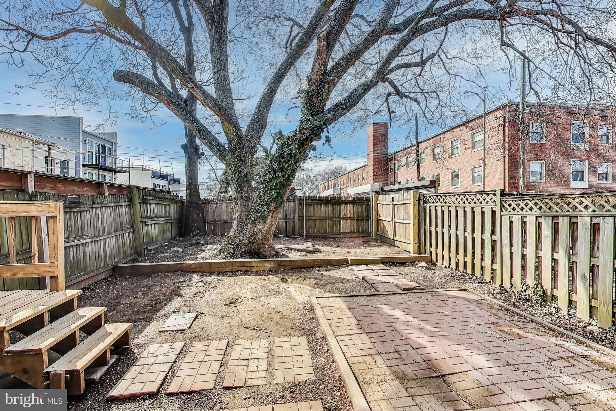 212 Elm Street Northwest Washington, DC 20001 - Photo 46 of 50 a view of a yard with wooden fence