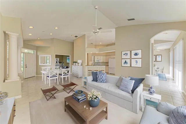 a kitchen that has a sink and a stove in it