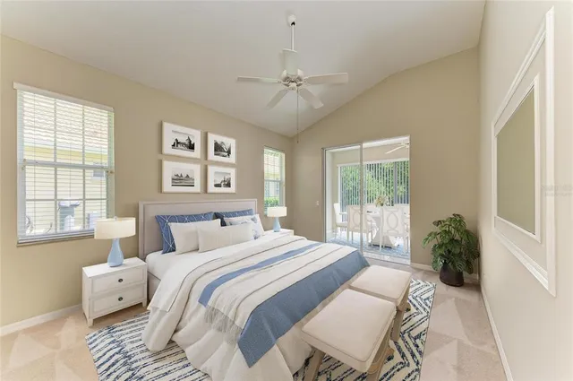 an empty room with fan and windows