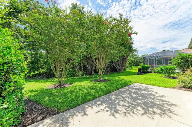 a front view of a building with garden